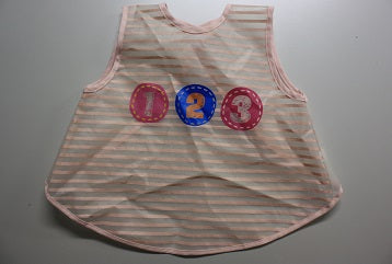 3-6 months dress over pvc bib